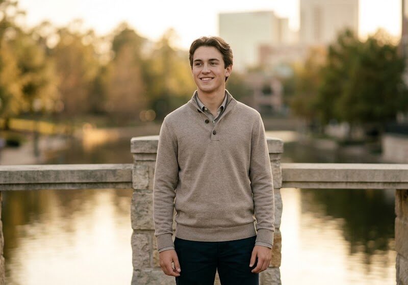 A picture of a senior high student during his senior portraits in The Woodlands, Texas.