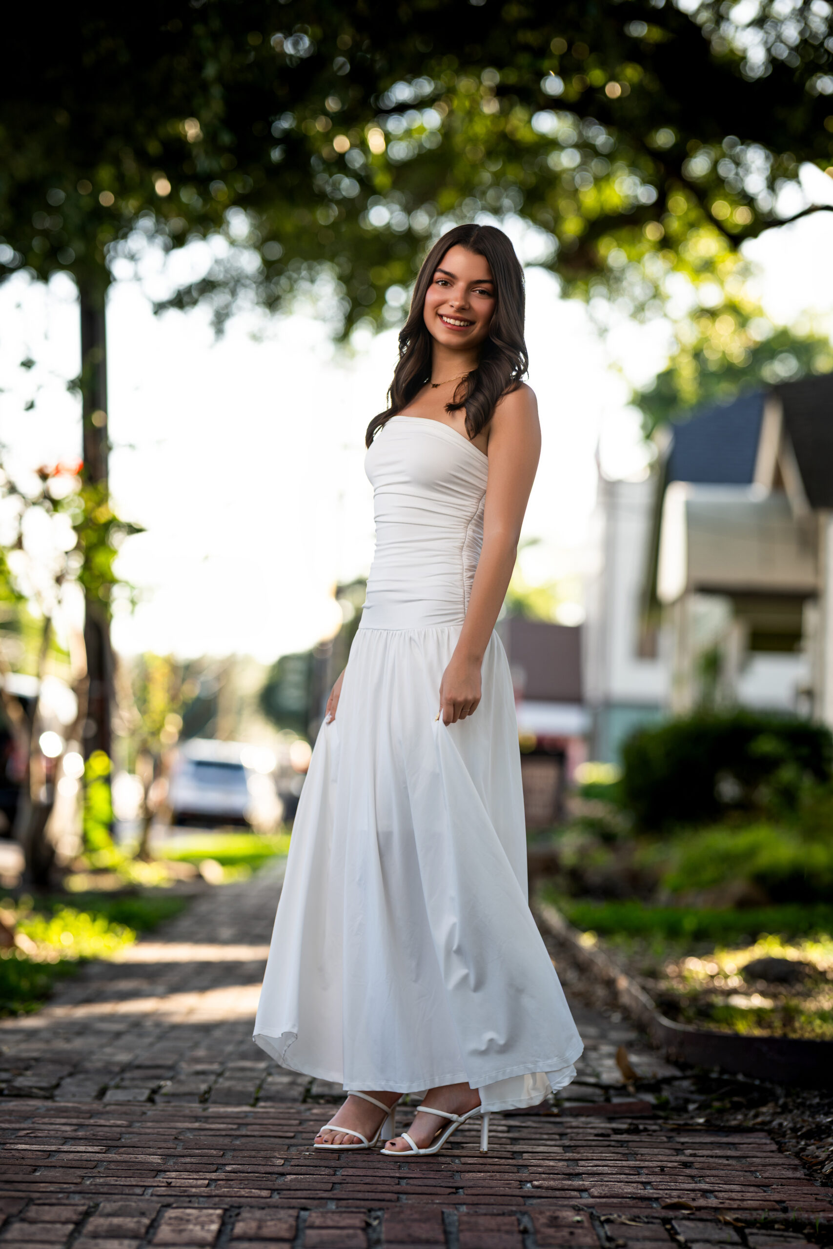 Picture of a high school senior posing for her senior portraits near Katy, Texas.